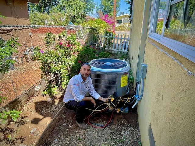 A finished Pon Air condenser installation in a Fontana backyard.